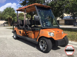 Orange Tomberlin 6 Passenger Lifted Golf Cart fleming island golf cart rental, golf cart rentals